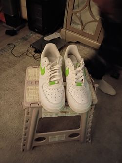 White with a lime green swoosh