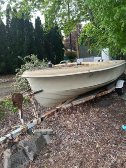 Small boat with trailer and motor