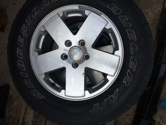 Four Jeep rims