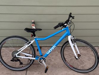 Woom 5 8 speed light weight aluminum kids bike