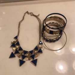 Gold tone and blue choker necklace with four matching bracelets