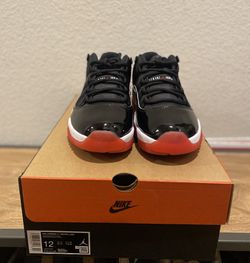 Jordan 11 Low Bred