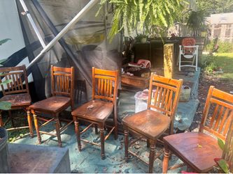8 tall wooden chairs