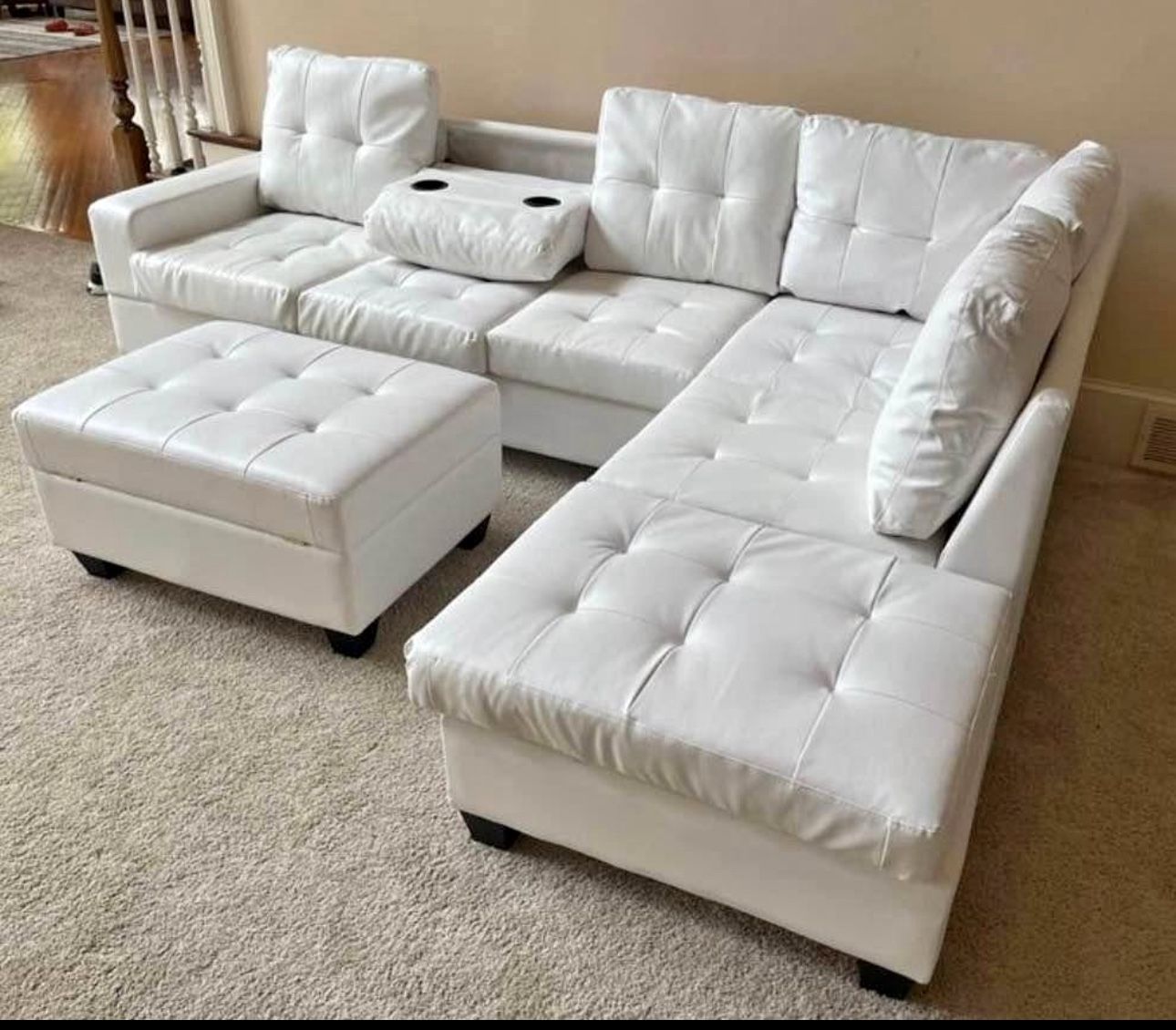 New white leather L-shaped sectional sofa couch with storage ottoman and drop down cupholders
