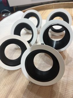 Set of 6 black and white recessed light trim rings.