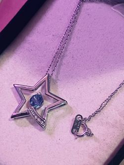 KAY JEWLERS 10 kt STAR PENDANT AND 10 kt CHAIN WITH REAL TANZANITE AND DIAMONDS $130 OBO