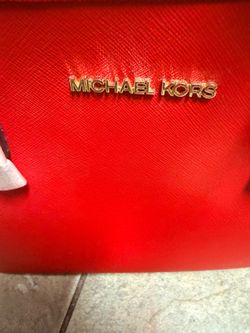Bright red Micheal Kors jet set tote