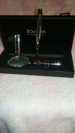 Bombay pen and magnifying glass