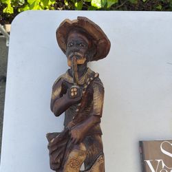 Vintage Haitian hand carved wooden sculpture man with pipe