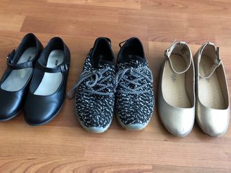 Lot of gently used girls shoes.