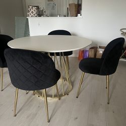 White Round Dining Table With Gold Base & 4 Black Velvet Chairs