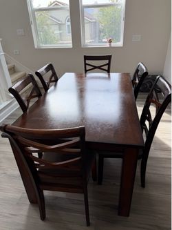 Used dining table with 6 chairs