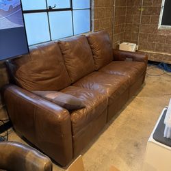 Electrically Reclining Leather Couch 