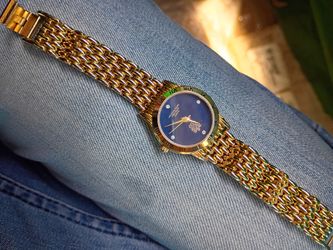 Golden Paolo Gucci watch
