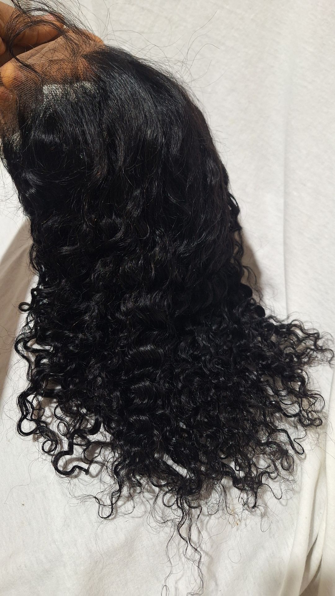 100 percent Pure Human Hair Lace Front Wig. 20 inches long. Free parting