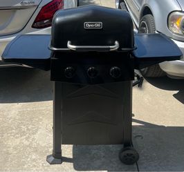 The Dyna-Glo 3-burner Open Cart Propane Gas Grill in Black