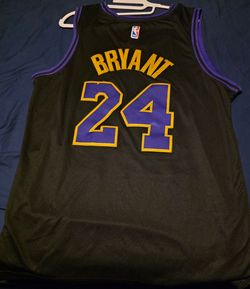 LAKERS JUMP SUIT AND JERSEYS