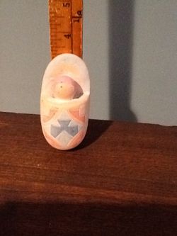 Southwestern decorative items . Frame $10. Comerrchero painting $20. Wooden woman $5. Southwestern teddiebear ornament $5. Papoose $5