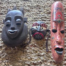 Wooden masks- Africa, Galapagos, South Korea