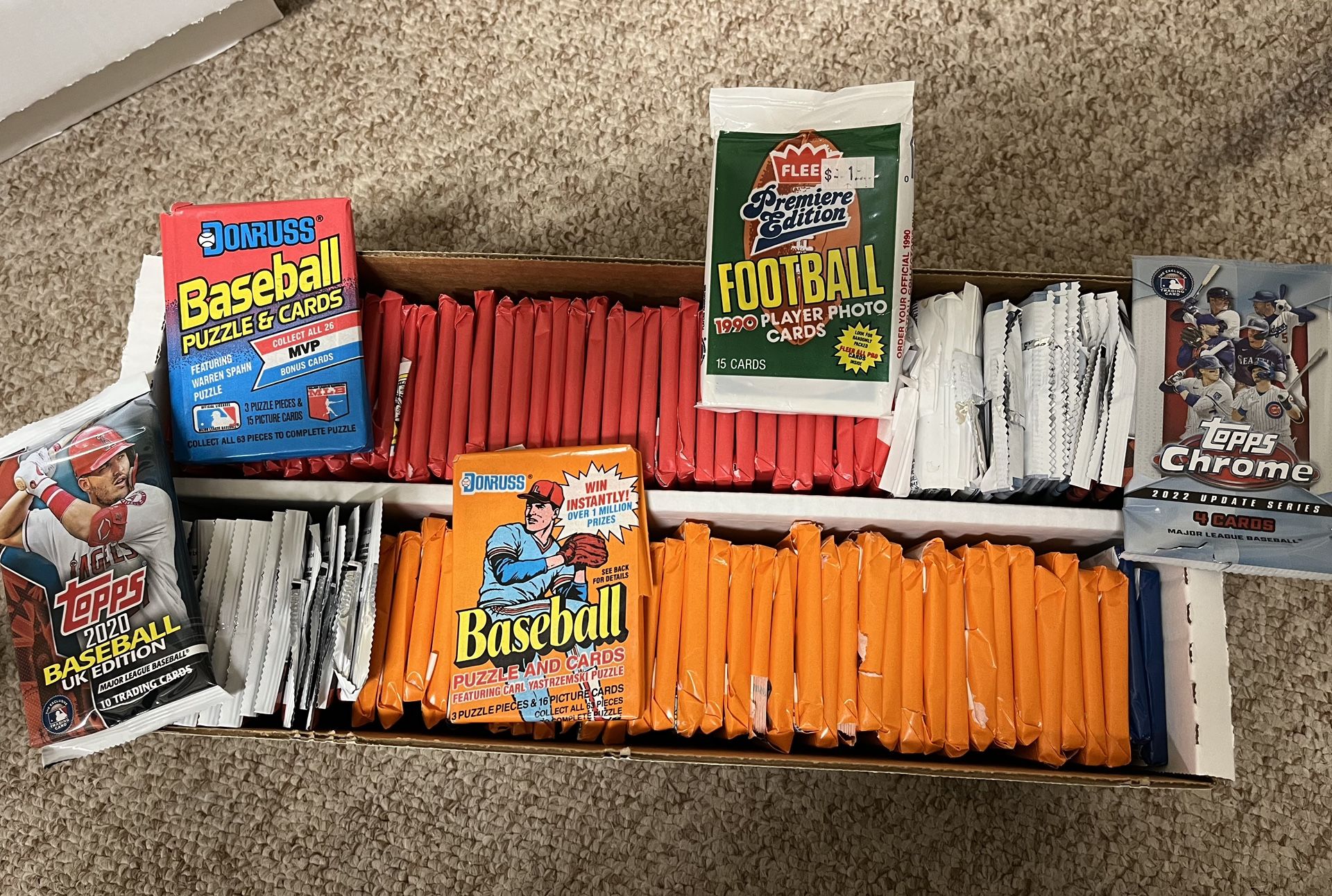 Box of Open Baseball & Football Card packs