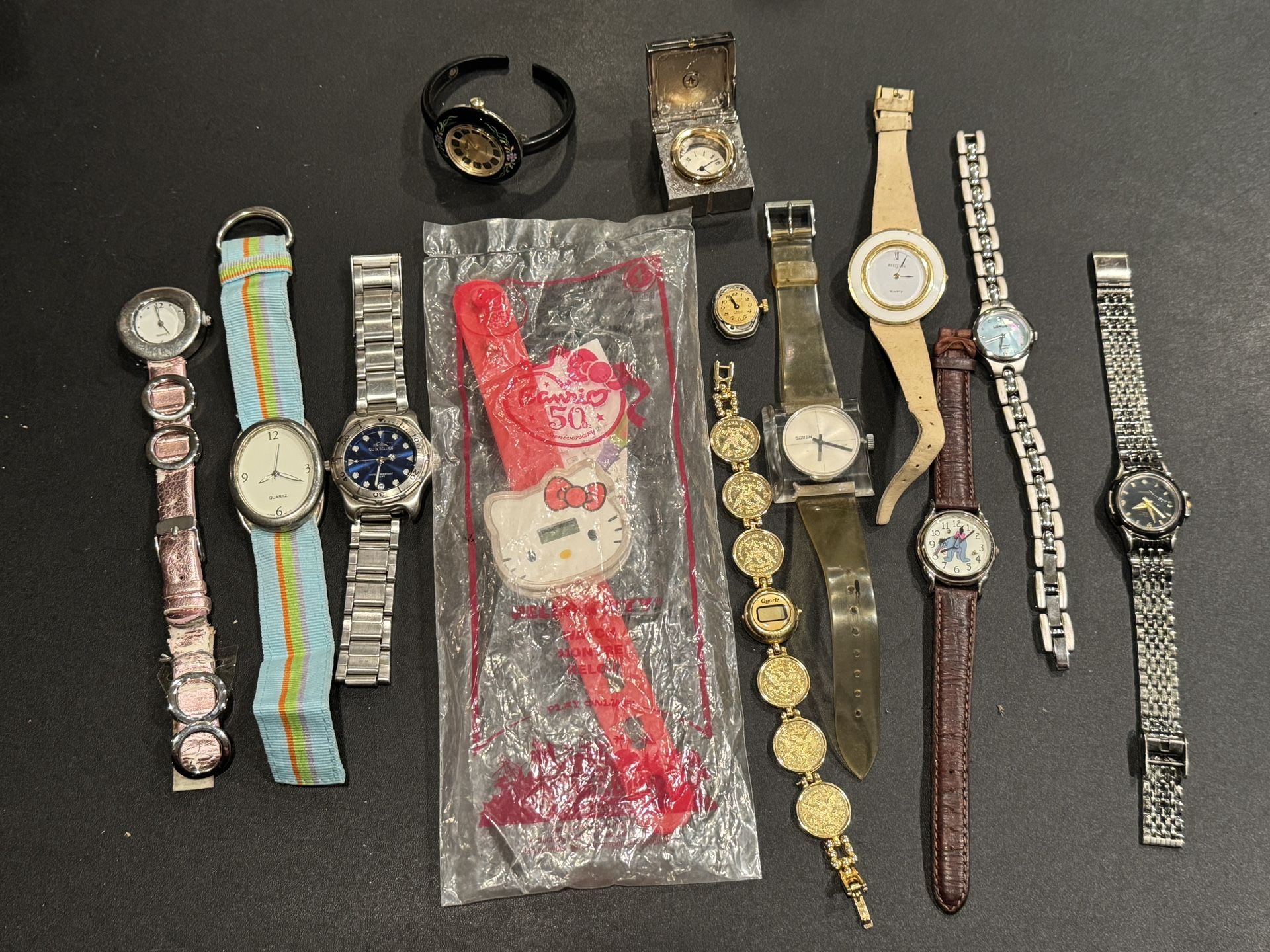 Lot Of 12 Miscellaneous Mens/ Women's Watches. Not running, sold for parts or repair