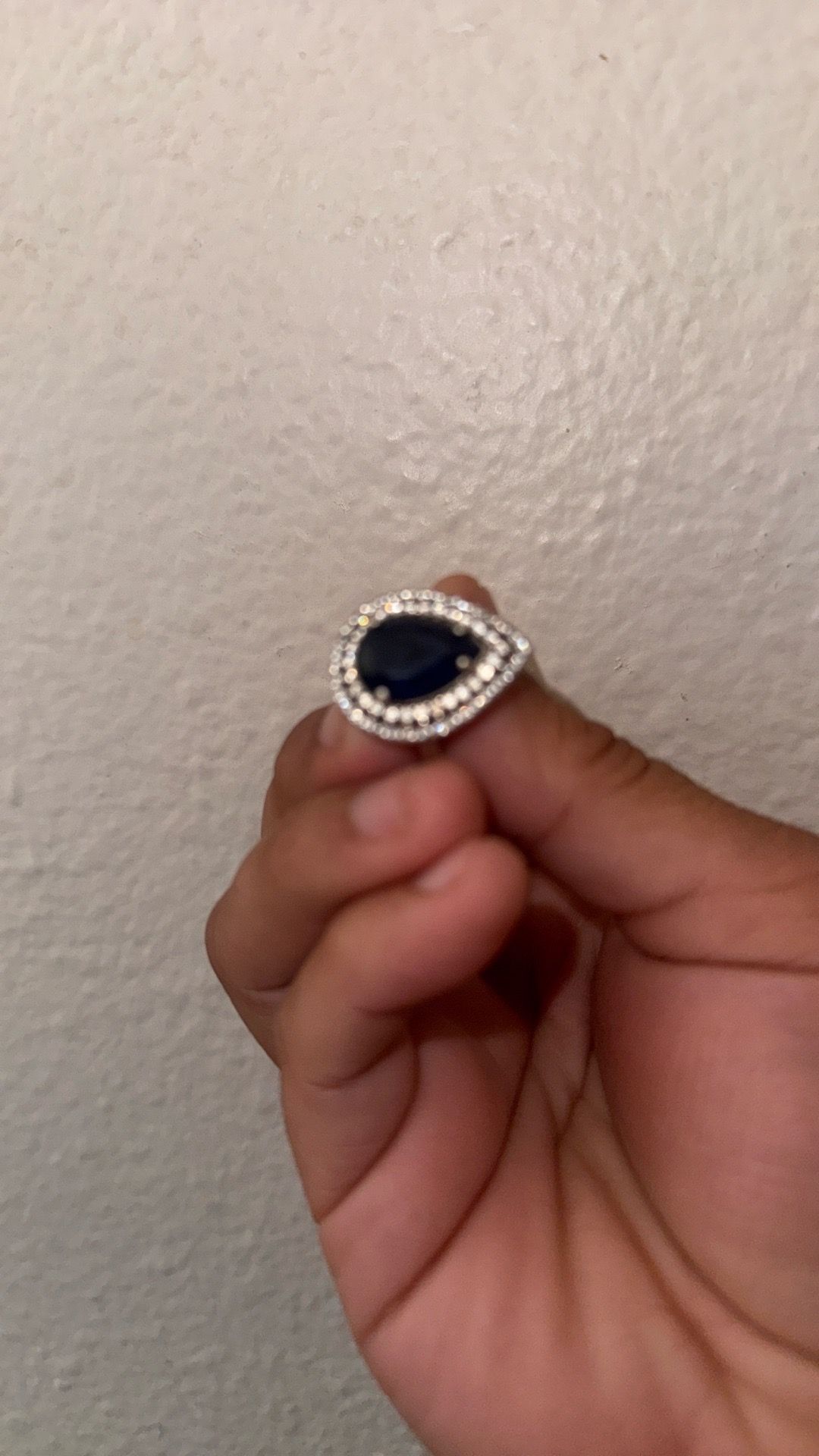 pear-shaped blue sapphire engagement ring