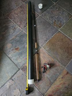 Abu Garcia 5000 c high speed retrieve and like new Luhr Jensen  rod.