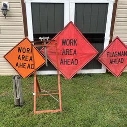 Construction equipment, signs and two stands