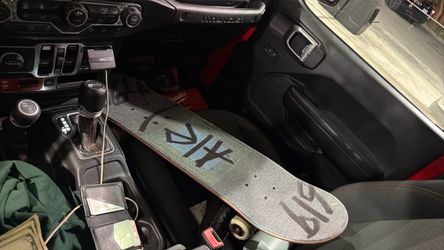 Used Skateboard with Grip Tape