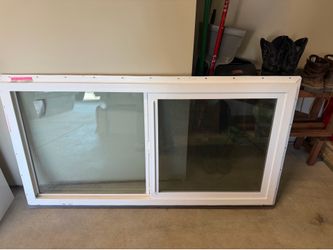 White Vinyl Sliding Window – 54 1/2” x 27 1/2”