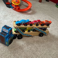 Wooden Tractor and Trailer with 6 Unique Race Cars