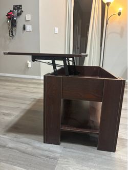 Coffee table with lifting top cover