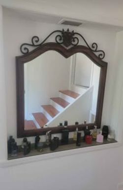 Beautiful wood and wrought iron Drexel mirror. 39 x 42H