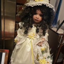 Tall porcelain Collectible Doll , in good condition 