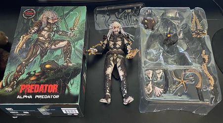 Alpha Predator missing one piece (spike piece) and poster