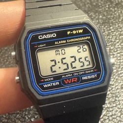 F91 Unisex Casio Digital Watch  New Battery inside  no tag no box   For men women or teen   Color Black and Little Blue    working great