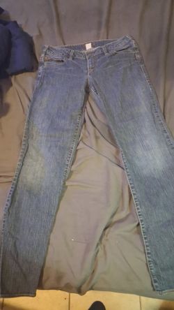 1 pr of women's blue jeans size 30/31 and https://offerup.com/redirect/?o=MS5wcg== of long multicolored shorts size 30, pants by (silver jeans)