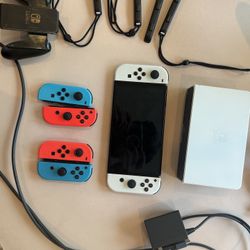 OLED Nintendo Switch + 4 extra Joy Cons