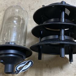 Landscape lights, pagoda style, black, metal-and-glass construction.