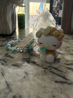 Hello Kitty Tanned Summer Series Gold & Teal Figurine Keychain / Bag Charm