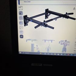 Wall mounted pull up bar