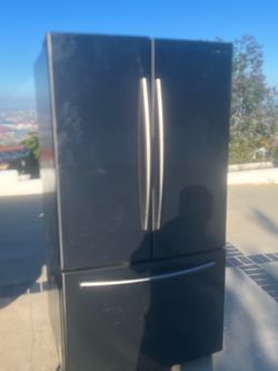 Stainless steel Samsung refrigerator and freezer