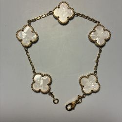 White and gold clover bracelet
