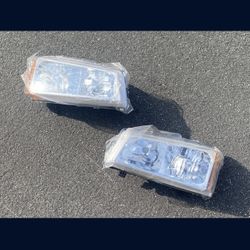 03-06 CHEVY SILVERADO HEADLIGHTS $50