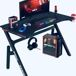 GAMING DESK WLED LIGHTS & GAMING CHAIR W BLUETOOTH&SPEAKERS ((32”x11”x23”)REG PRICE $999