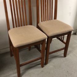 2 Solid wood stools chairs good condition 26 inch height