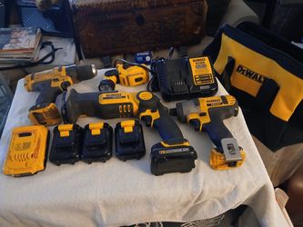 Selling Combo Set Dewalt Tools 12 V Saw Saw Pivot Screw Impact Drill  Flash Lite  12 And 20v Charger  4 12v Batteries  1 20v  Battery  Plus Bag $ 300 