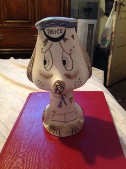 Vintage Italian ceramic coin bank, hand painted police dog