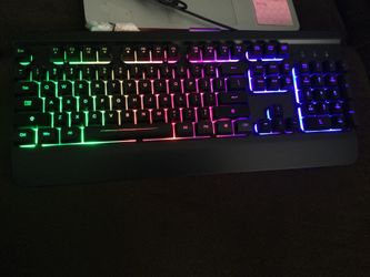 RGB  Lighted WIRED Gaming Keyboard, nice , metal, sturdy 104 keys. Keys are soft. Not noisy