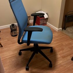 Swivel Office Chair Also It Has The Armed Where You Go Up Higher Or Lower